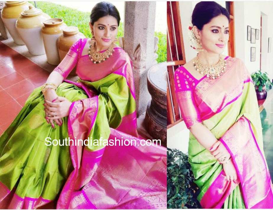 actress sneha prasanna in a green pattu saree at a wedding