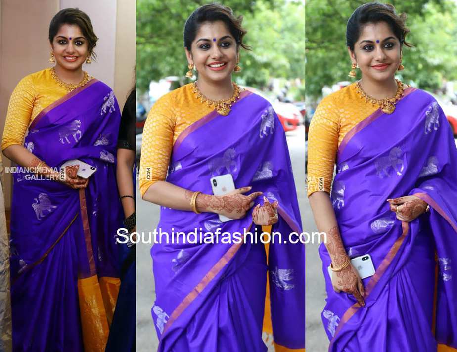 meera nandan purple saree yellow blouse at sreejith ravi wedding