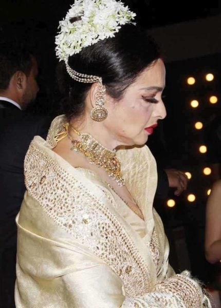 rekha high bun with gajra 