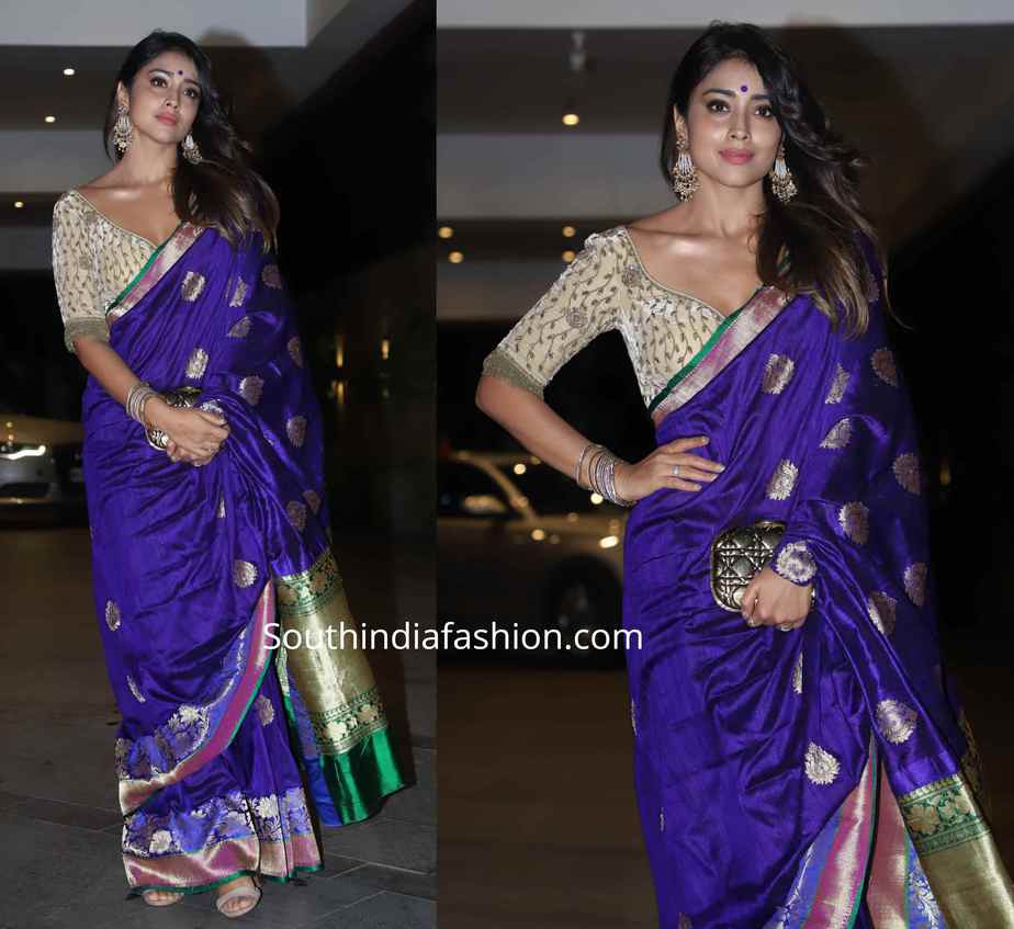 Shriya Saran in a purple banarasi silk saree at a Diwali party