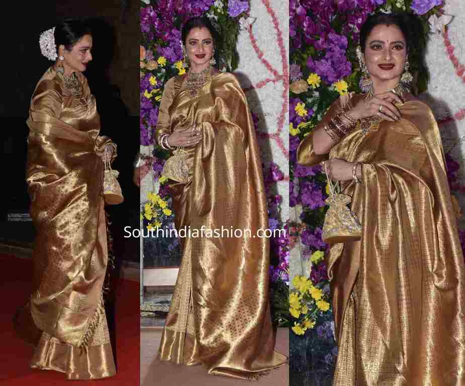 rekha gold kanjeevaram saree at a wedding reception (1)