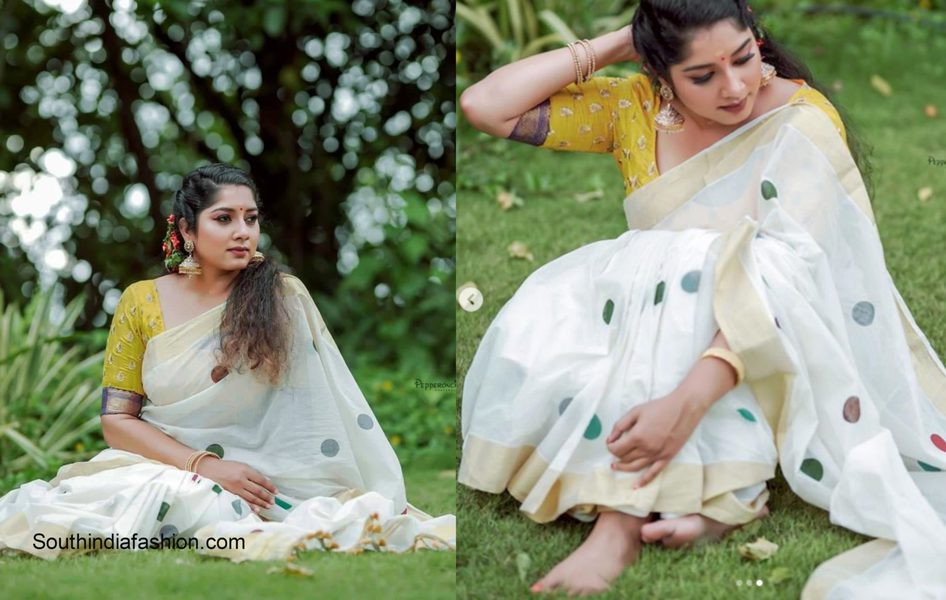 Anumol in a white traditional kerala saree