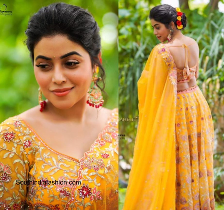 Poorna in a yellow floral lehenga