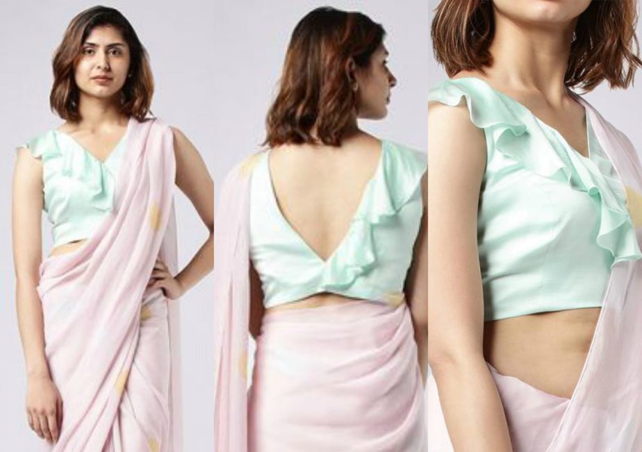 nayantaara pastel pink polka dots saree with ruffled blue blouse