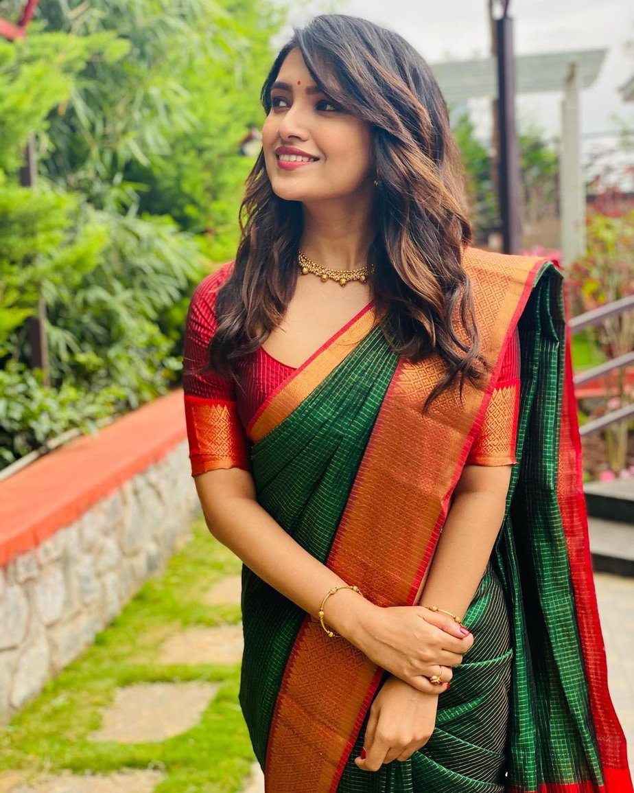 vani bhojan in traditional green silk saree