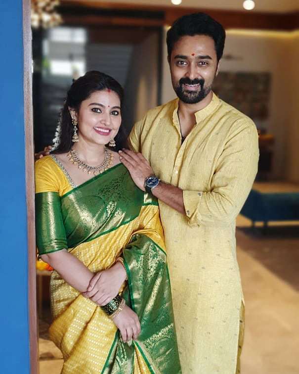 Sneha prasanna in yellow saree by muhurth and prasanna in gold kurta for diwali 4