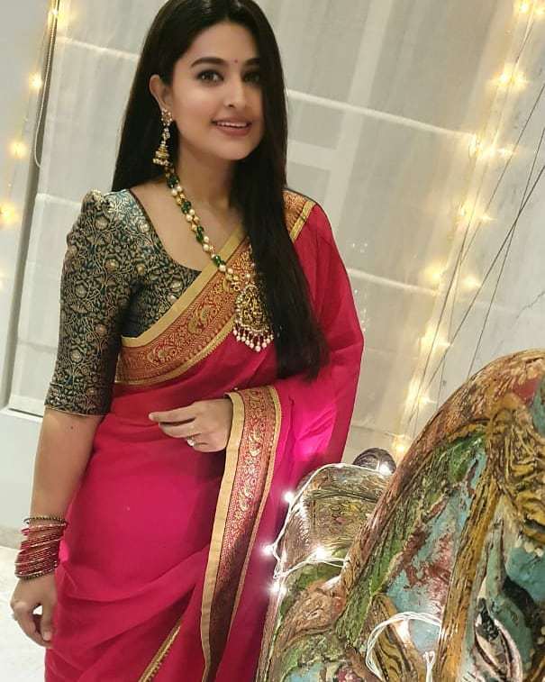 Actress Sneha in a red saree and balck blouse by geethu haut couture2