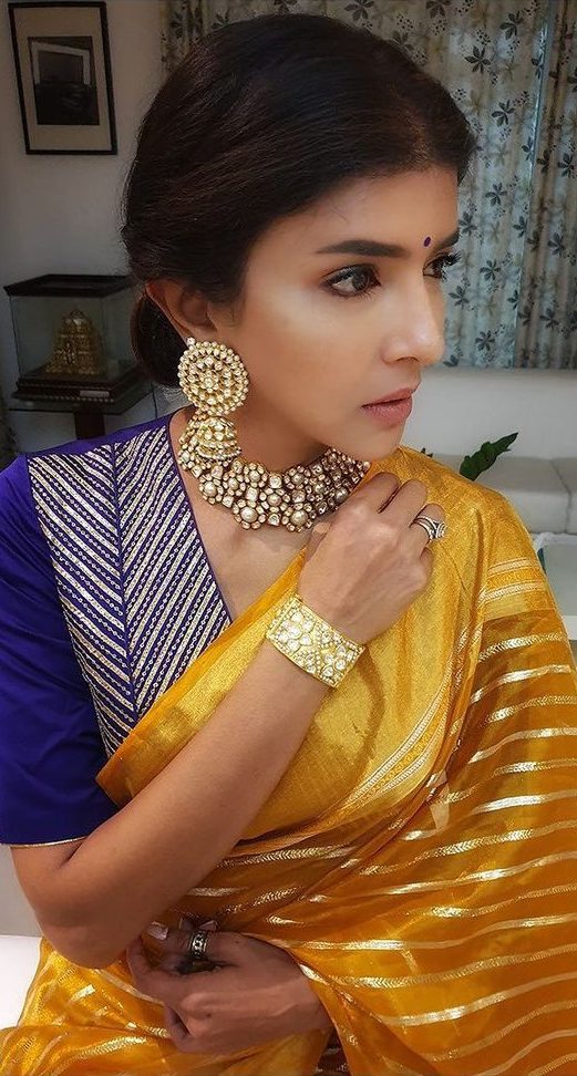 Lakshmi manchu in a yellow saree by raw mango