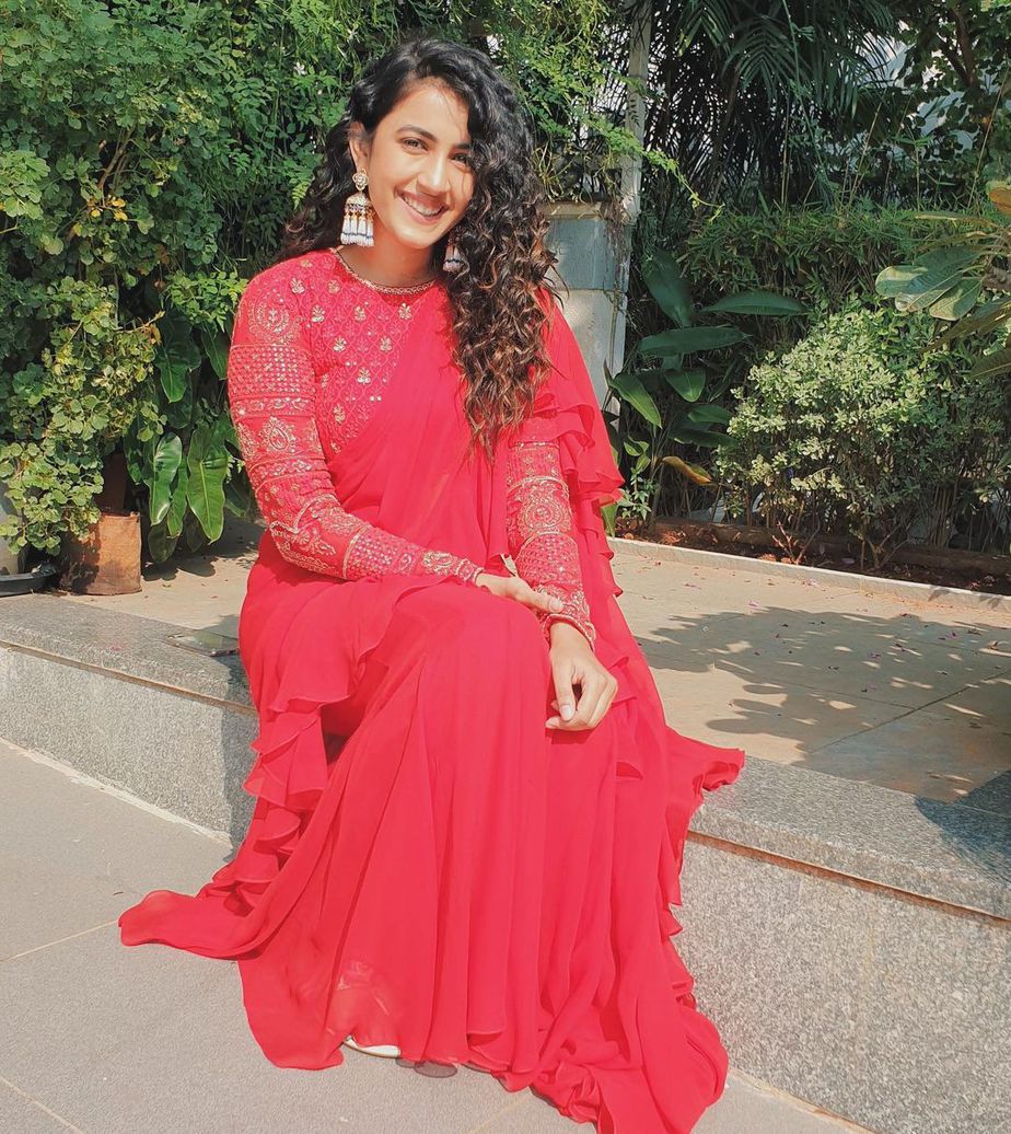 Niharika konindela in a red ruffle saree