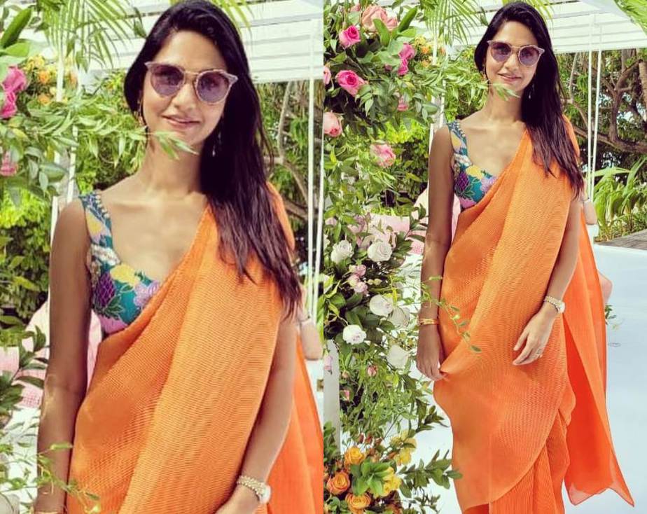 Sneha reddy in an orange pant saree by aisha Rao for a wedding in Maldives1