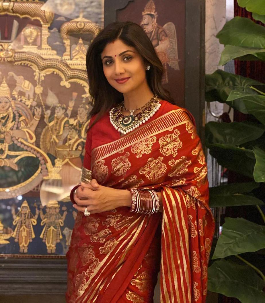 Shilpa Shetty looks stunning in a maroon foil printed saree by Masaba