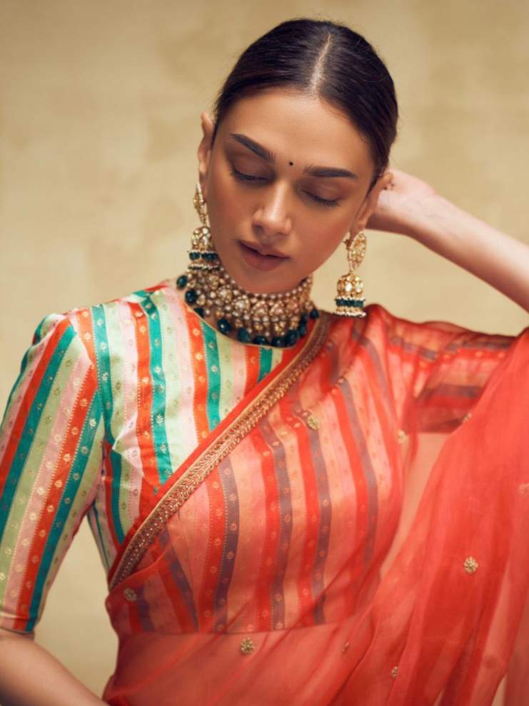 Aditi Rao Hydari looks regal in a red saree from the label