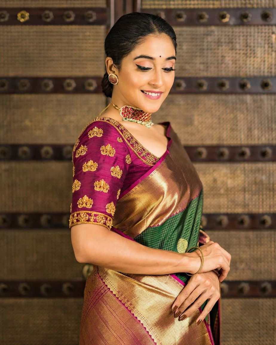 regina cassandra traditional look in green silk saree