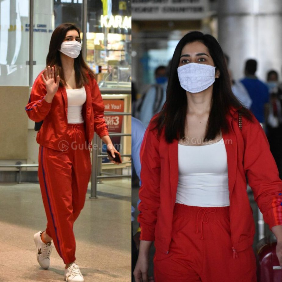 Raashi Khanna at airport in red jacket and joggers
