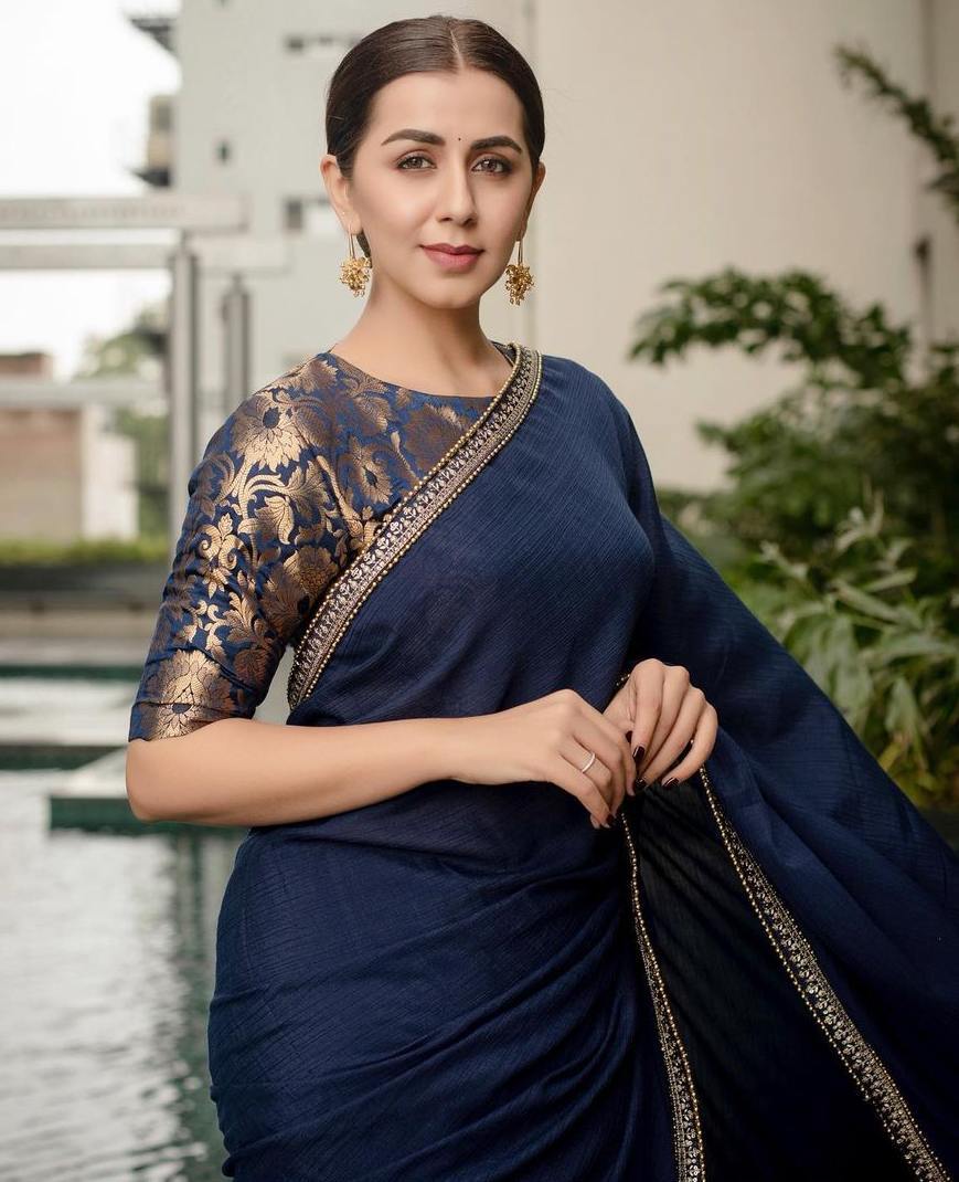 nikki galrani in navy blue georgette saree with brocade blouse