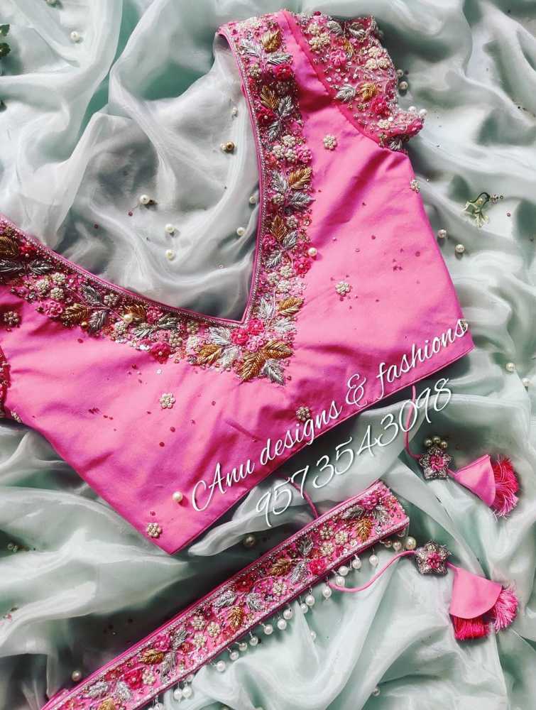 pink maggam work designer blouse with floral embroidery designs and belt