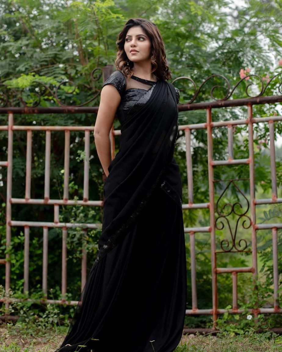 Athulyaa Ravi goes all black with a sequinned half-saree!