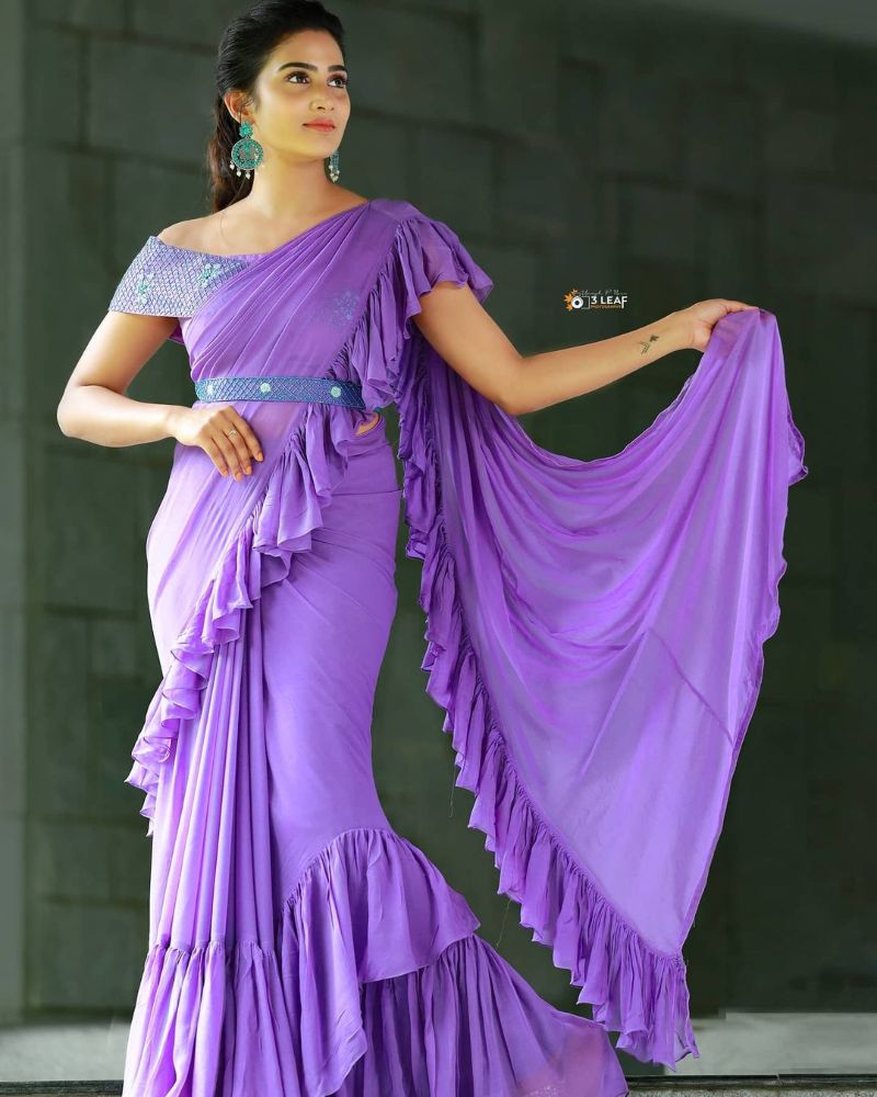 aditi ravi in a light purple ruffled saree with belt