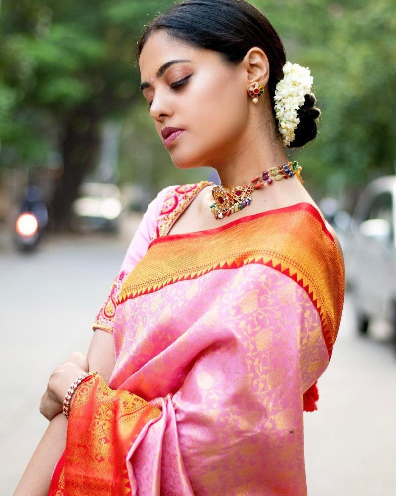 bindu madhavi at a friend's wedding in a pink silk saree