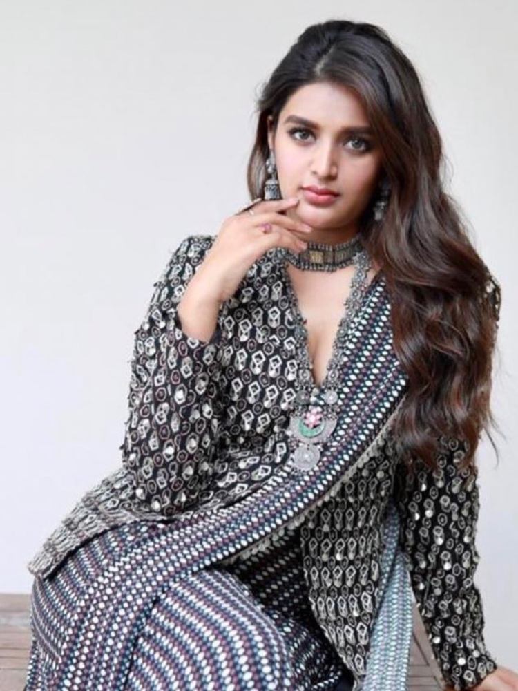 nidhi agerwal bhoomi eeswaran promotions in black and white