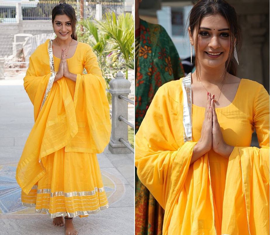 payal rajput in a bright yellow long anarkali to visit temple in hyderabad