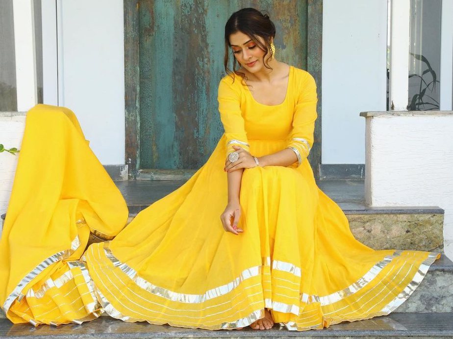 payal rajput in a yellow anarkali suit set