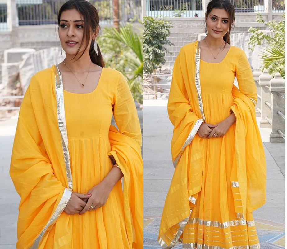 payal rajput in bright yellow long anarkali to visit temple in hyderabad