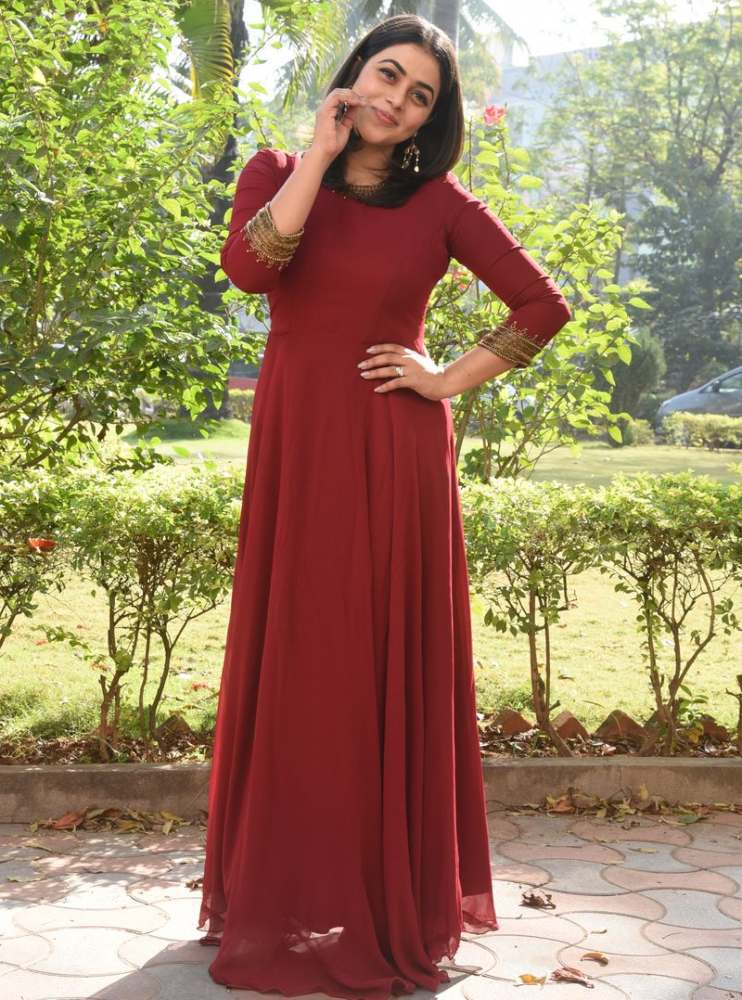 poorna in maroon dress at power play trailer launch