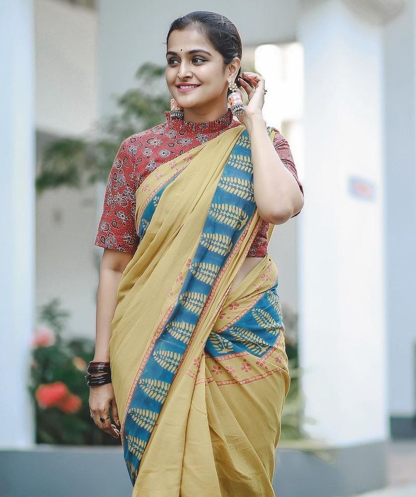 ramya nambessan in yellow cotton saree with red blouse