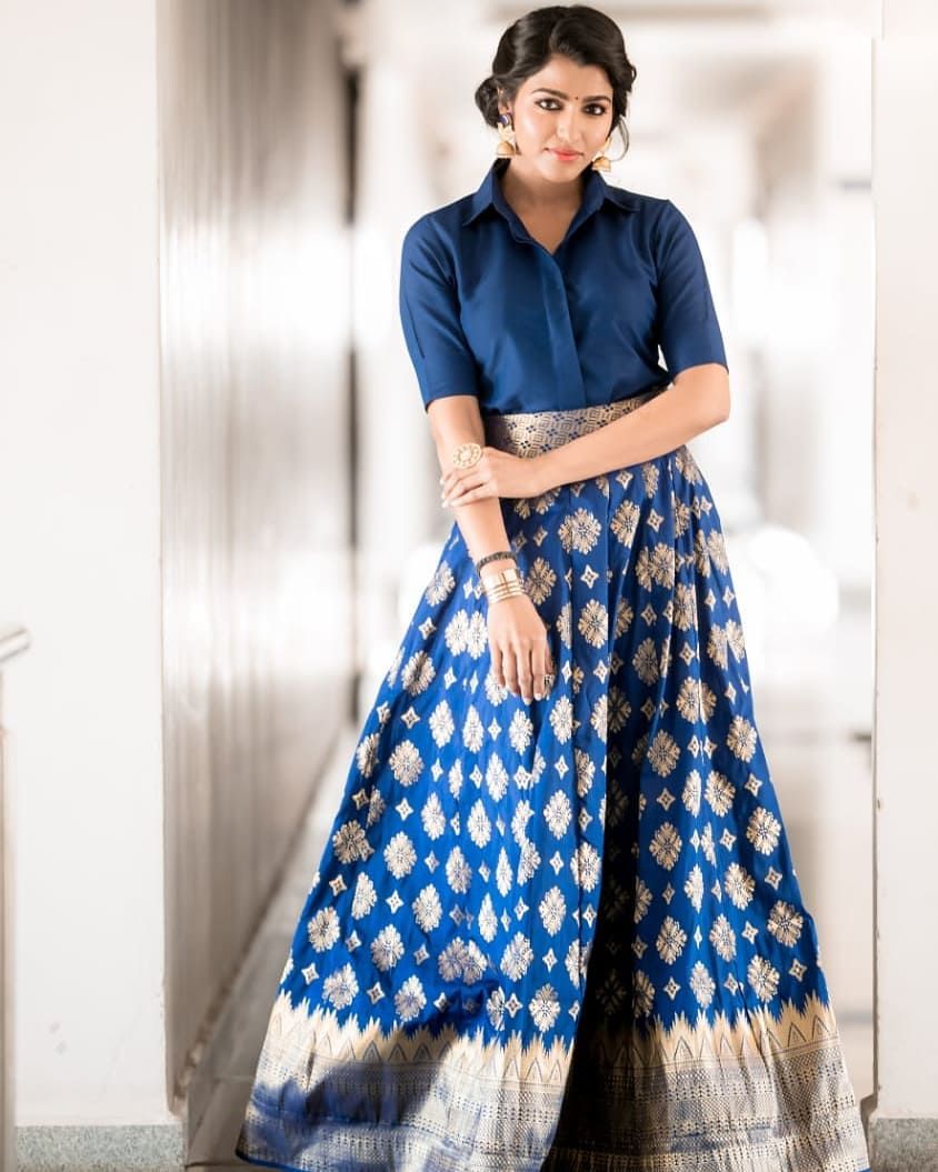 sai dhansika in a blue skirt and shirt