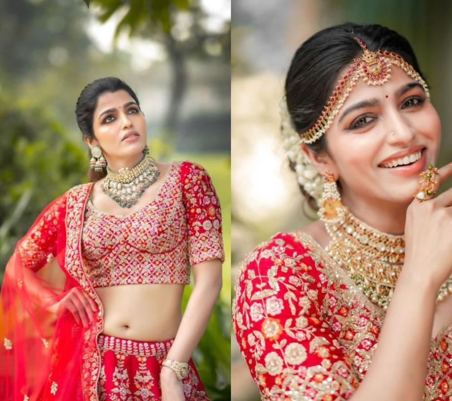 sai dhansika in a chilli red bridal lehenga for varaa cover shoot