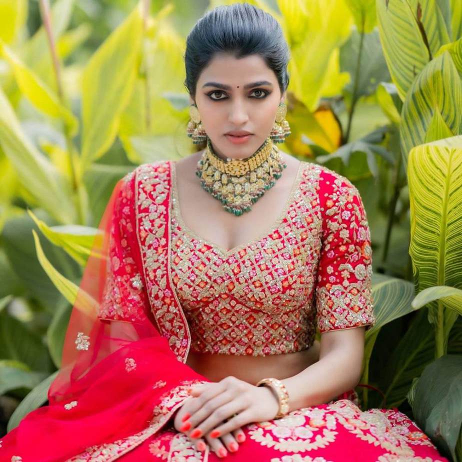 sai dhansika in red bridal lehenga varaa magazine cover shoot