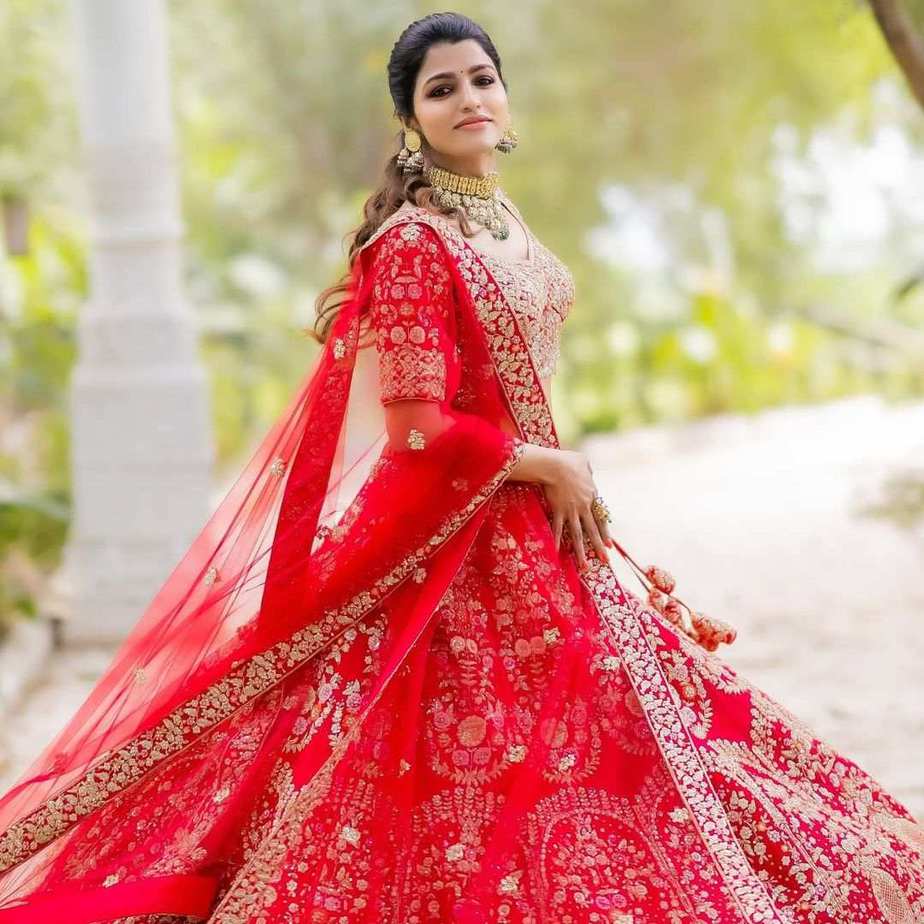 sai dhansika in red bride lehenga for varaa magazine cover shoot