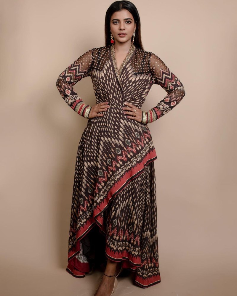 aiswarya rajesh in a black printed asymmetrical dress