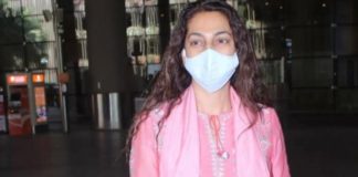 juhi chawla in pink suit at the airport