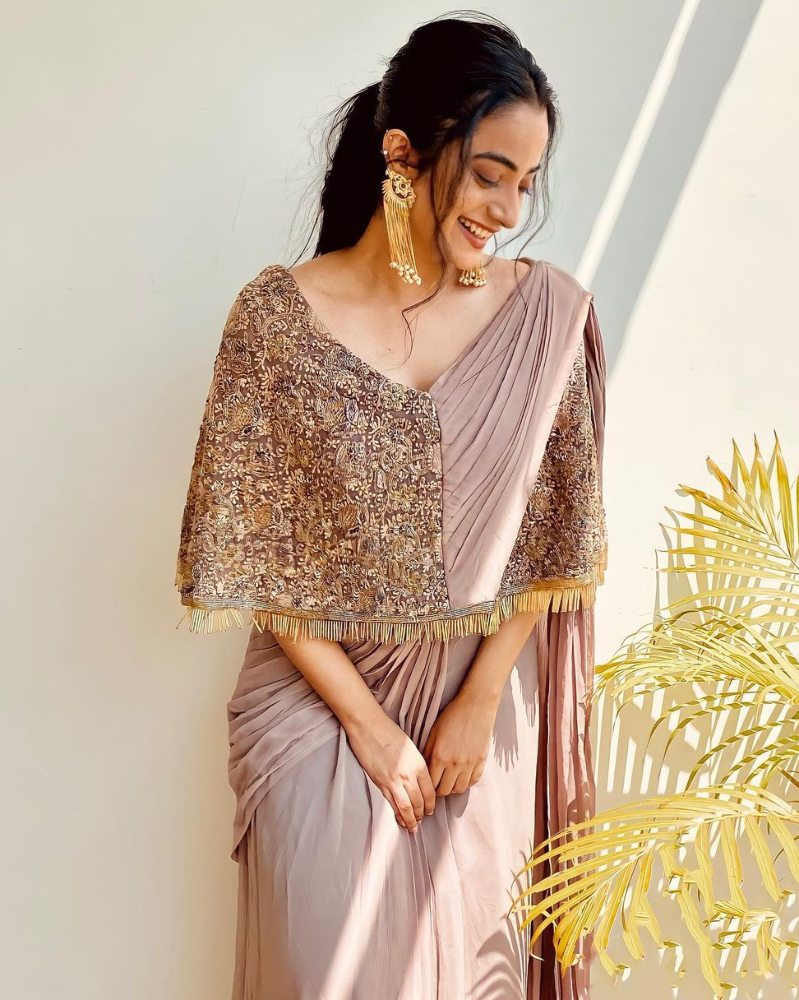 namitha pramod in a beige saree gown with cape from label'm