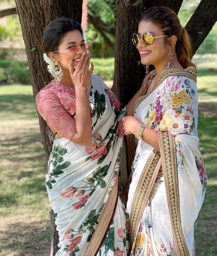 sreeja kalyan and sushmita konidela in sabyasachi floral sarees at niharika wedding