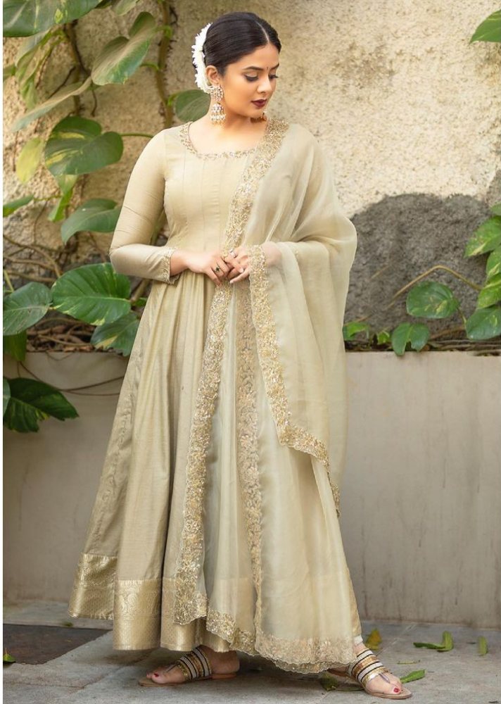 sreemukhi in long beige anarkali set