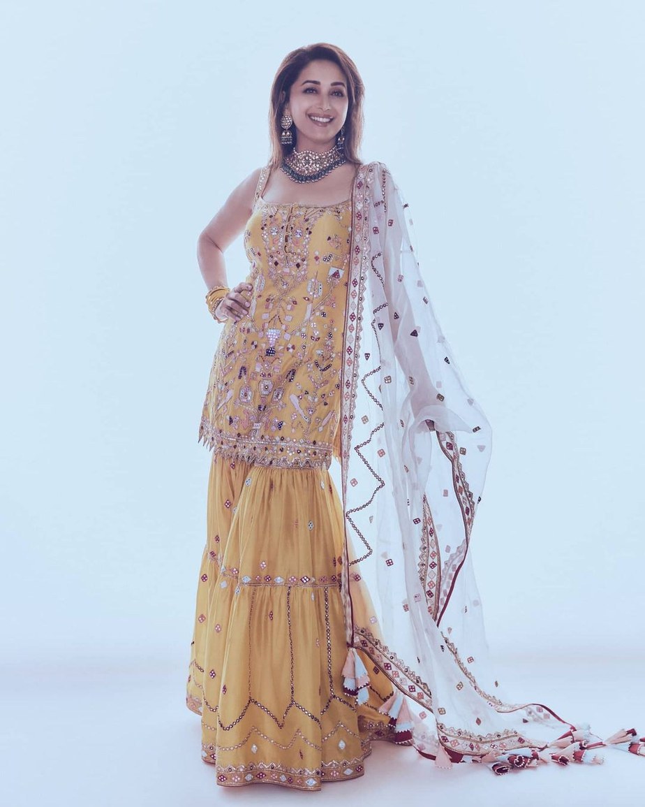 Madhuri Dixit turns heads in a yellow kurta set for "Dance Deewane!"