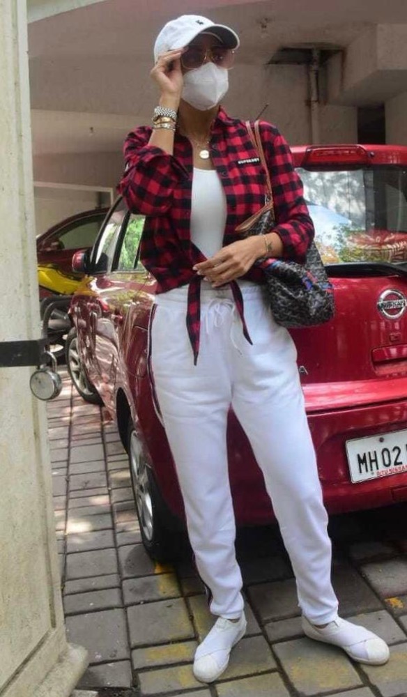 shilpa shetty in red checkered jacket and white shirt