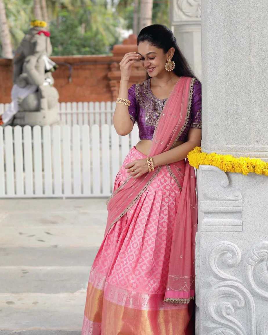 Aishwarya Arjun looks ethereal in a soft pink half-saree for her ...