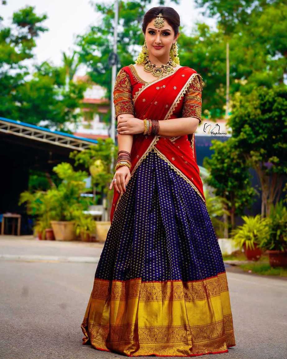 Sridevi Vijakumar looks beautiful in a red kanchi pattu half saree ...