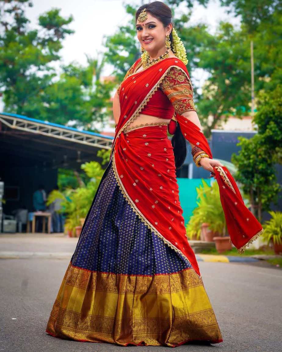 Sridevi Vijakumar looks beautiful in a red kanchi pattu half saree ...