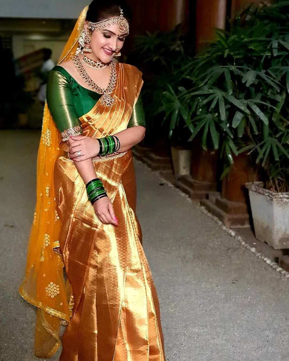 Sridevi Vijaykumar resembles royalty in a gold pattu saree for ...