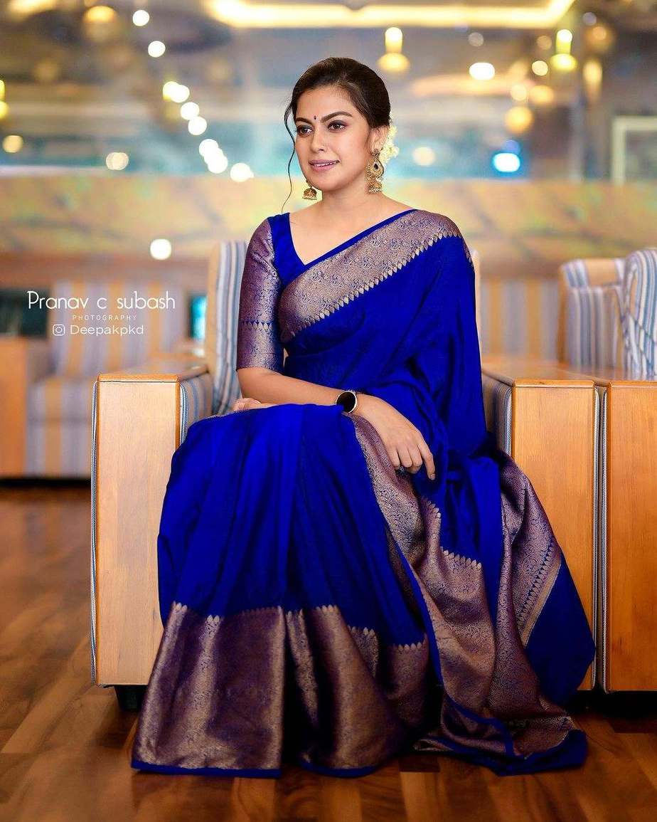 Anusree Nair aces the traditional look in a royal blue pattu saree!