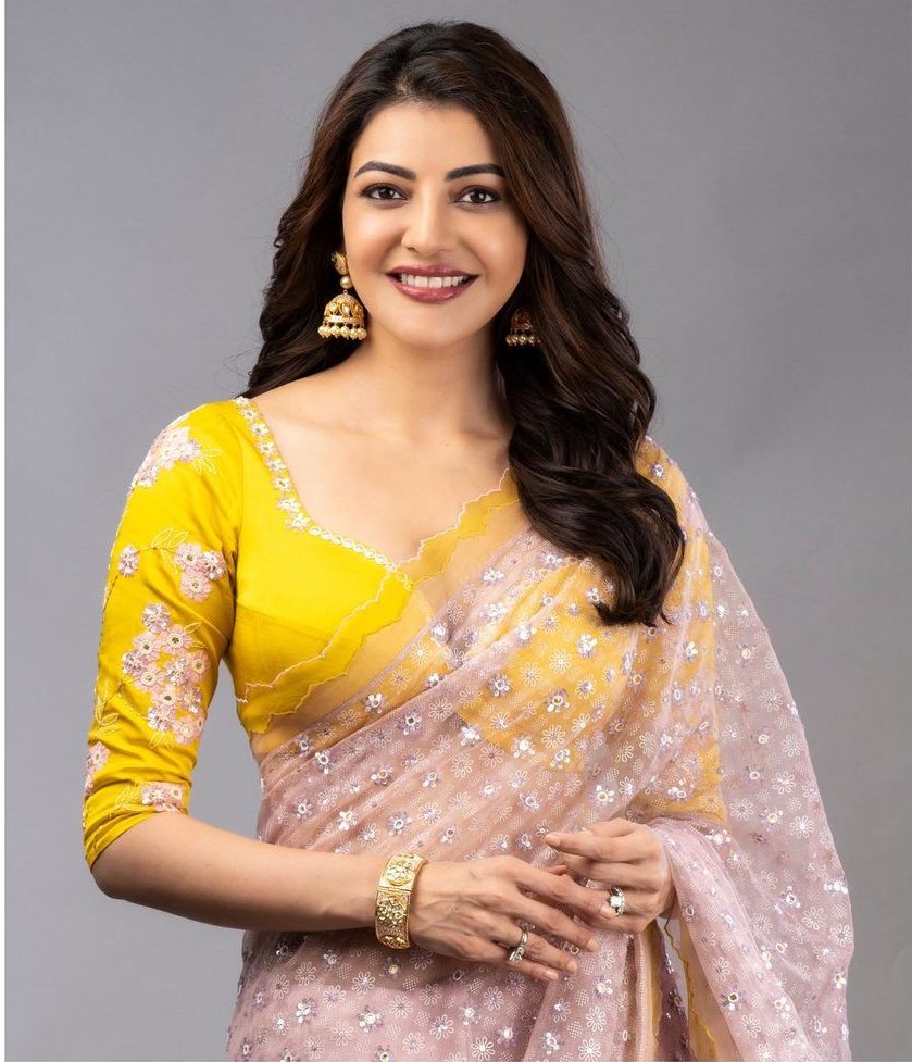 Kajal Aggarwal gleams in a blush pink organza saree!