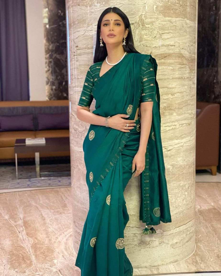 Shruti Haasan looks elegant in a green silk saree!