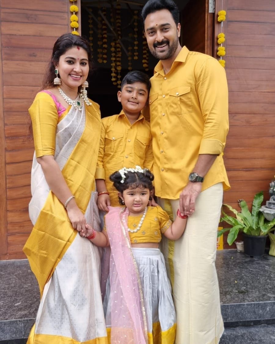Sneha prasanna and family in matching yellow ivory outfits for Diwali21-2