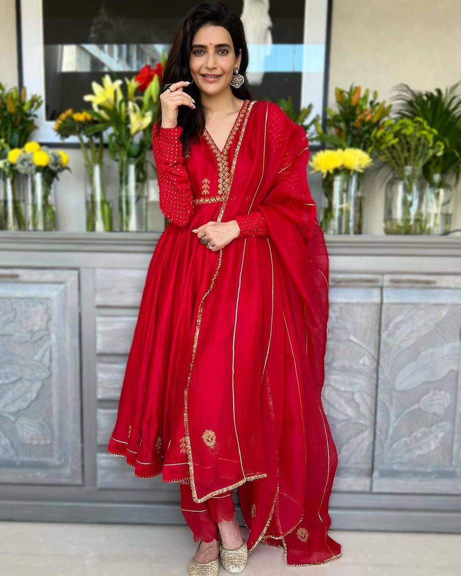 Karishma Tanna looks ravishing in a red kurta set for a puja!