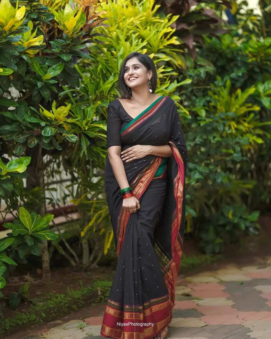 Black linen-cotton saree | Fashionable saree blouse designs, Black saree  designs, Saree wearing styles